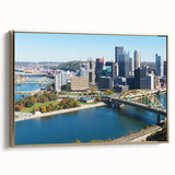 Framed canvas of a vintage Pittsburgh landscape in black and gold tones, ideal for bedroom wall art.