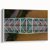 Vintage poster art of West Virginia scenery on a framed canvas, featuring vibrant green and blue tones.