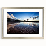 Textured art depicting abstract Yellowstone scenery in muted earth tones on a framed canvas, suitable for bedroom decor.