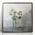 Framed acrylic wall art featuring an abstract floral design with vibrant colors, set against a sleek black frame, perfect for modern home decor.