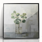 Framed acrylic wall art featuring an abstract floral design with vibrant colors, set against a sleek black frame, perfect for modern home decor.