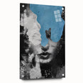 Abstract figurative acrylic artwork displayed in a glass frame, showcasing vibrant colors and intricate designs, with decorative pins enhancing its aesthetic appeal.