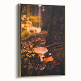 Framed canvas featuring a vintage-style landscape painting of autumn trees in gold and black tones.