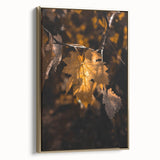 Framed canvas displaying a vintage landscape painting of fall trees in gold and black tones, ideal for bedroom wall decor.