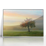 Framed acrylic wall art depicting an abstract landscape with soft blue, green, and white hues, designed to enhance modern decor with a serene aesthetic.