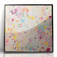 Framed abstract floral wall art featuring vibrant colors and intricate designs, set in a sleek black frame, perfect for enhancing modern home decor.