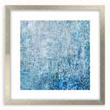 Abstract art print featuring colorful splatters in a silver frame with a mat, showcasing a modern design ideal for contemporary home decor.