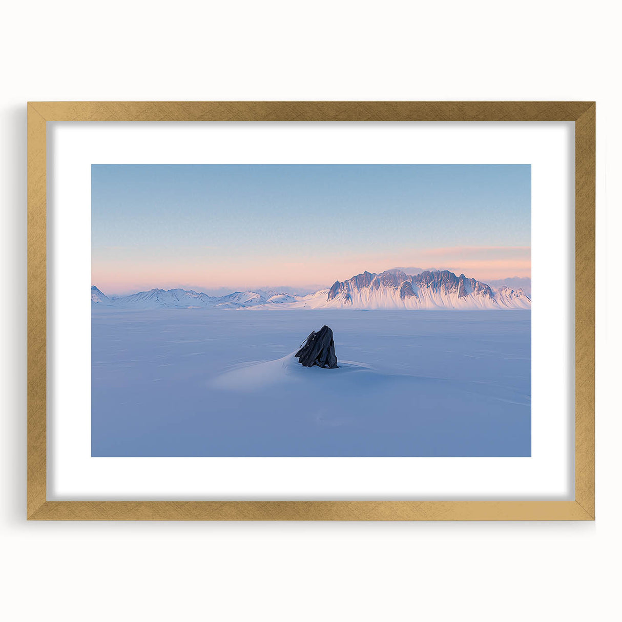 Elegant gold-framed landscape artwork depicting serene sand dunes at sunset, accented with a white mat for a polished look, ideal for home decor.