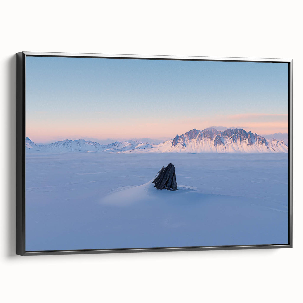 Framed canvas art depicting serene sand dunes in a minimalist style, featuring a sleek black frame. Ideal for modern home decor, this landscape piece adds tranquility to any space.
