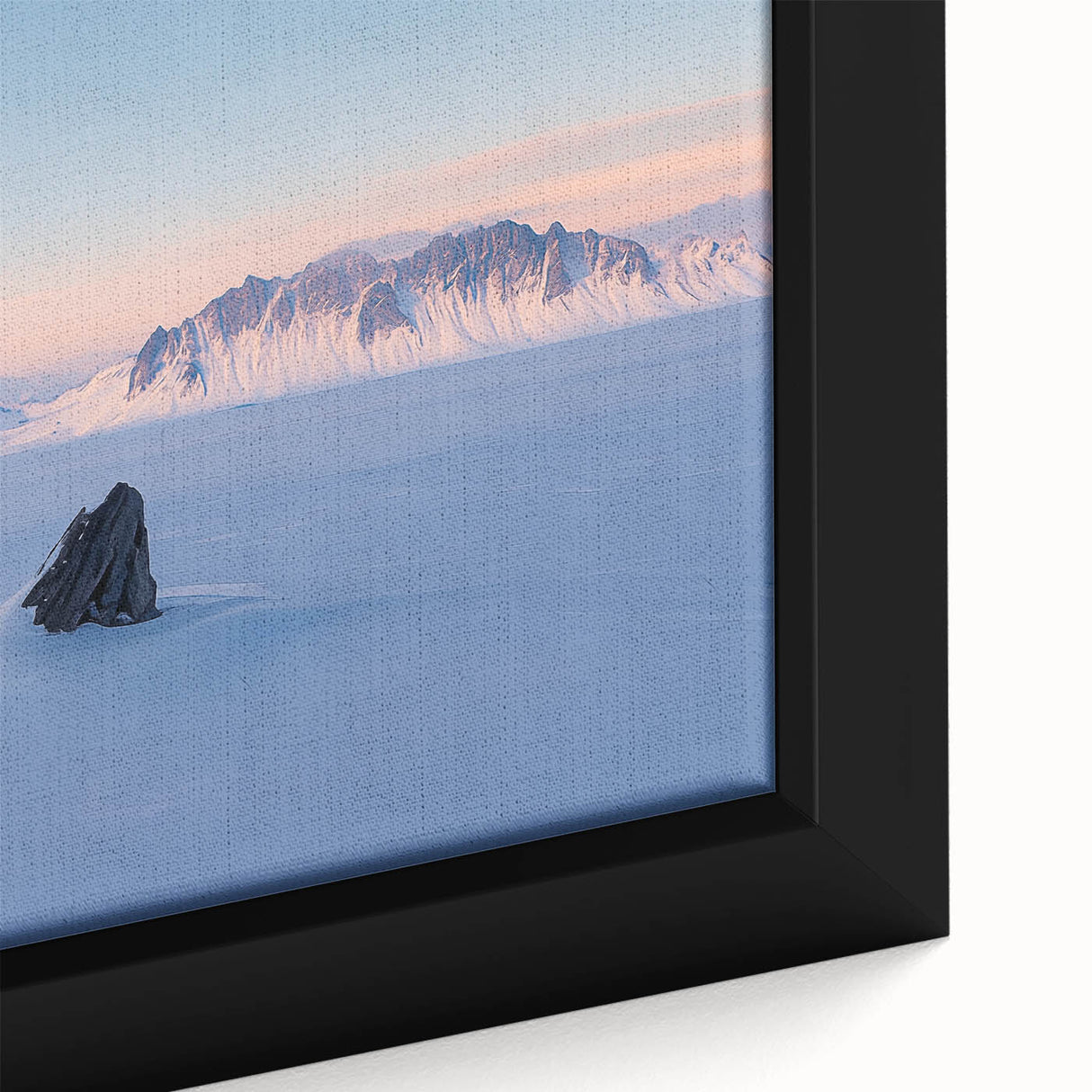 Close-up of a framed canvas depicting serene desert dunes at sunset, highlighting warm golden and orange hues with intricate texture details, perfect for home decor.