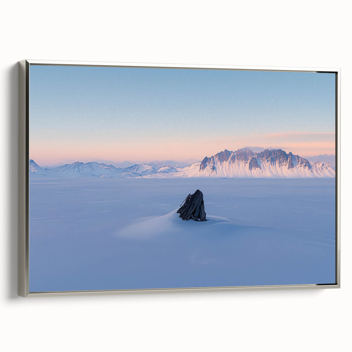 Framed canvas artwork showcasing serene sand dunes in a minimalist silver frame, adding elegance to modern decor. Ideal for enhancing living spaces with nature-inspired aesthetics.