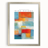Textured abstract art print in shades of blue and gray, framed in silver, ideal for modern bedroom ambiance.