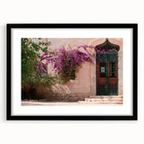 Abstract art print featuring vibrant, colorful textures, set in a large black-framed mat, ideal for living room decor.