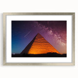 Abstract art print of Egyptian scenery in silver frame, featuring earth tones, ideal for dining room decor.