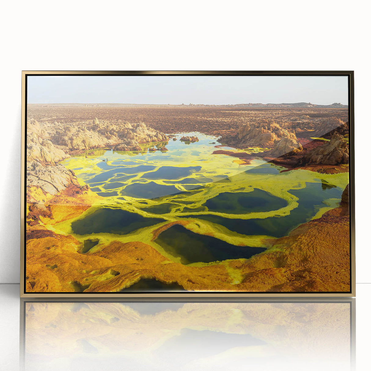 Mid-century modernist art depicting a serene Ethiopian landscape on a gold-framed acrylic, with earthy tones.