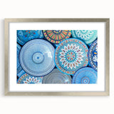 Abstract art print of a Moroccan landscape in muted earth tones on a framed silver mat, ideal for dining room decor.