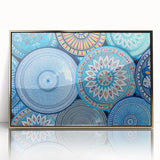 Mid-century modernist art depicting a Moroccan landscape in gold and earth tones on a framed acrylic.