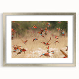 Abstract art print of a Namibian landscape, featuring earthy orange and brown tones on a silver-framed canvas.