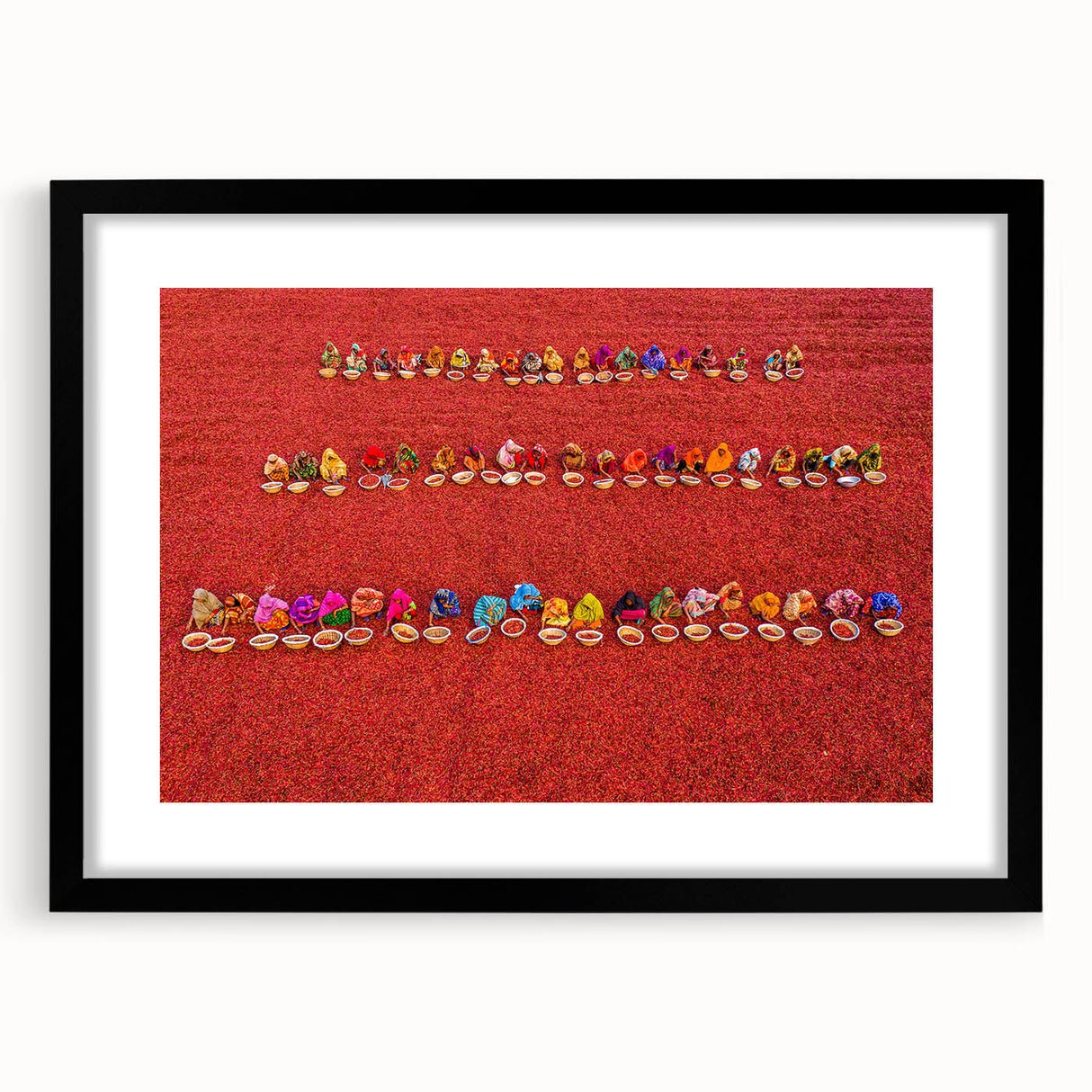 Extra large abstract art print of a colorful, textured scenery, framed in black, ideal for living room decor.