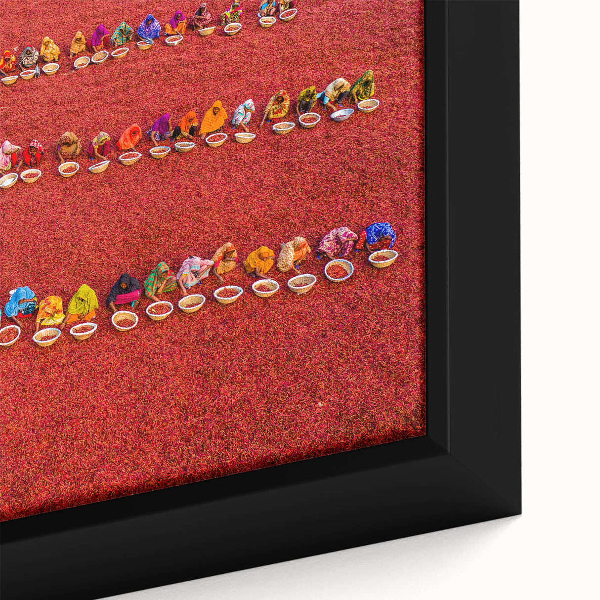 Close-up of extra large framed canvas featuring a textured, colorful abstract design on a black background.