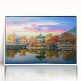 Acrylic print of a serene Korean landscape in muted green and blue tones, framed in white, suitable for modern nursery decor.