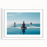 Abstract art print of Maldivian scenery in muted blue and green hues on a framed white mat.