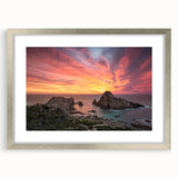 Abstract art print of Perth skyline in muted silver and blue tones, framed with a silver mat.
