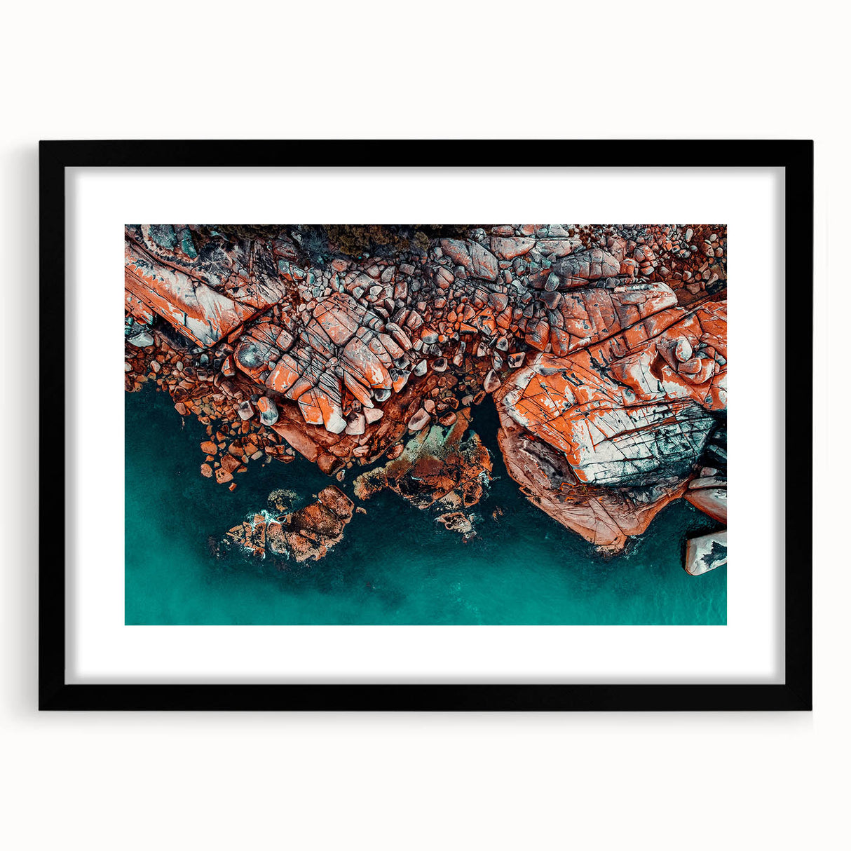 Abstract art print of colorful, textured scenery in Tasmania on a large black-framed canvas, ideal for living room decor.