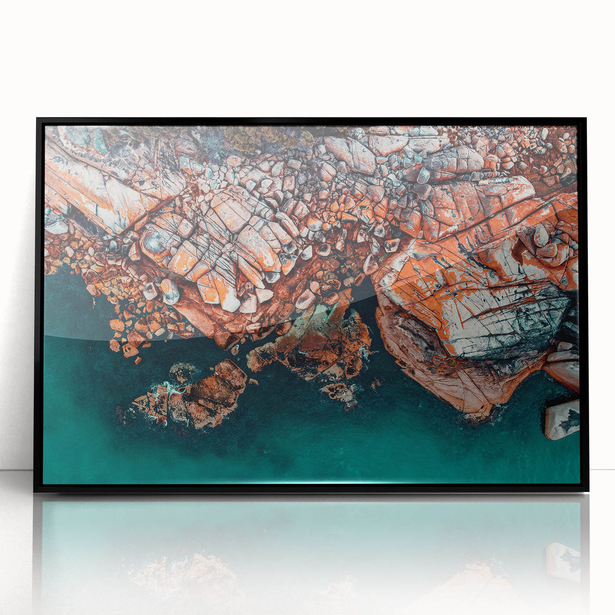 Large abstract wall art depicting a Tasmanian landscape in muted earth tones, framed in black acrylic.