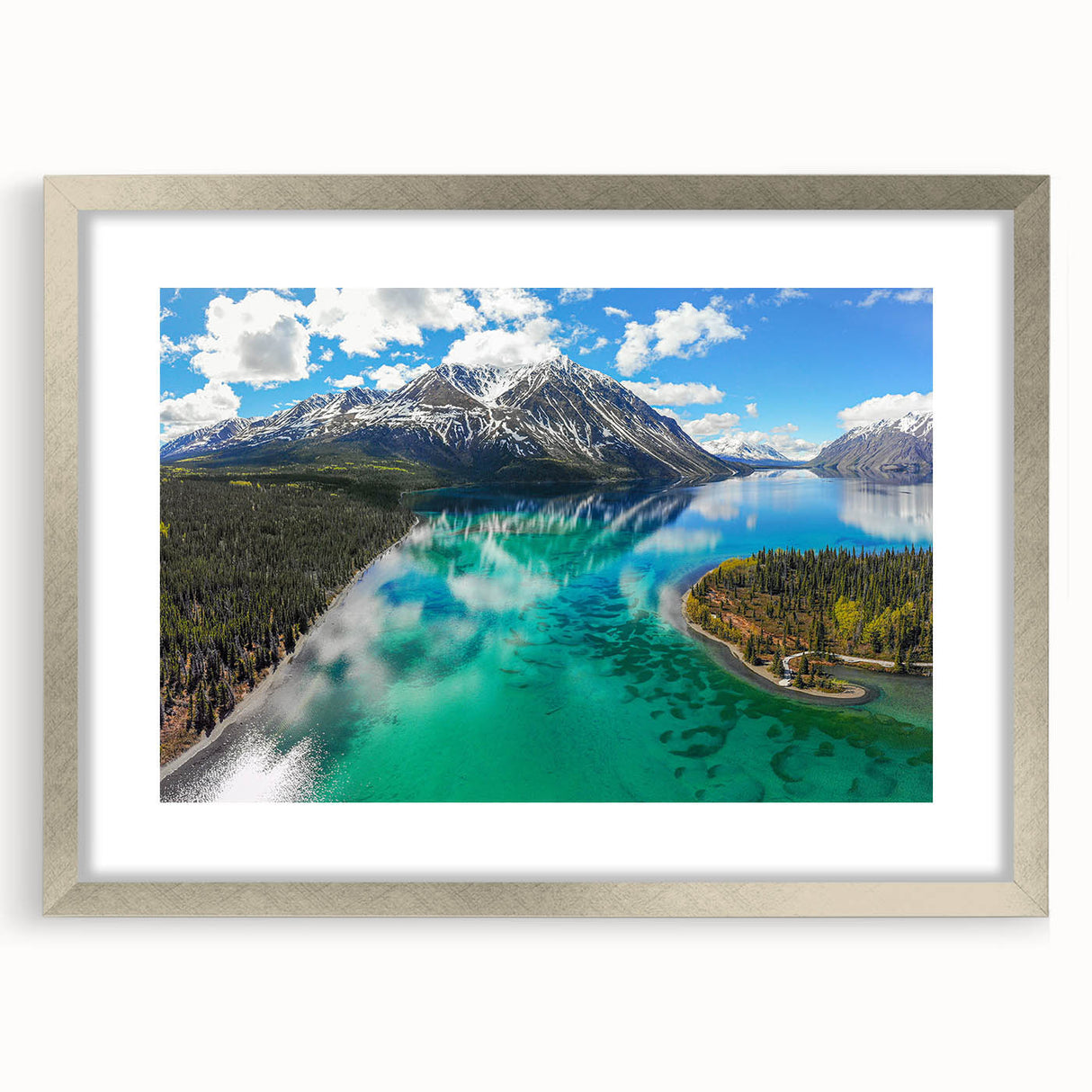 Textured abstract art print depicting a Yukon scenery in muted earth tones, framed with a silver mat.