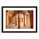 Colorful abstract art print of a European landscape in vibrant hues on a large framed canvas, suitable for living room decor.