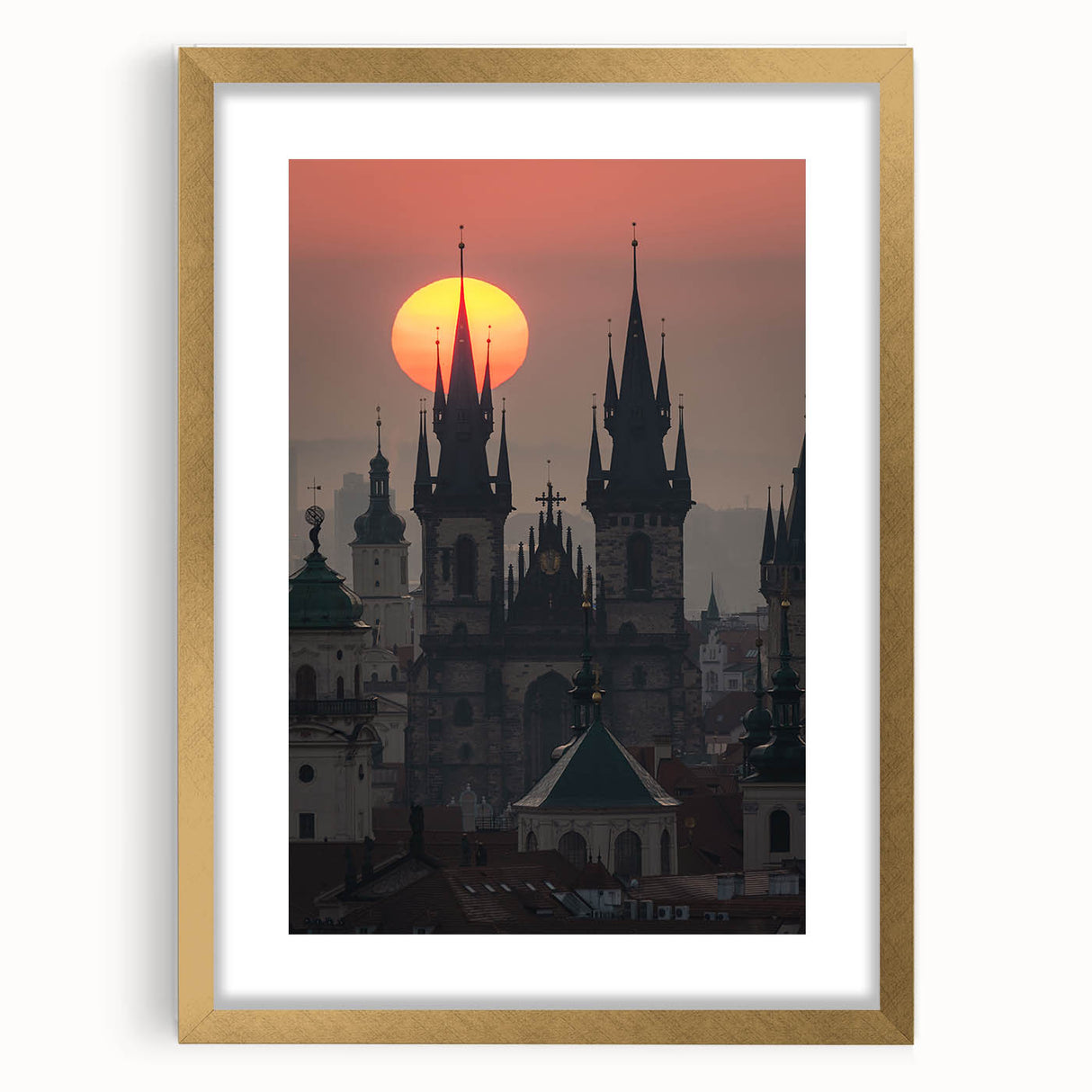 Abstract art print of Prague skyline in muted gold and blue tones on a framed canvas.