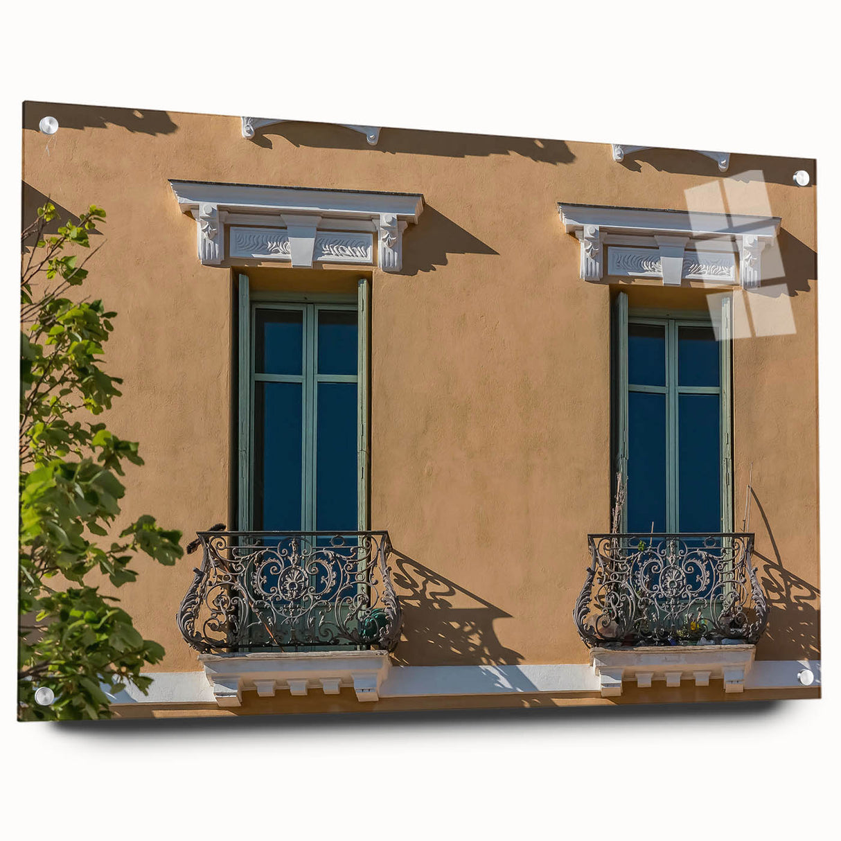 Large abstract wall art depicting a scenic view of southern France in muted earth tones on acrylic glass.