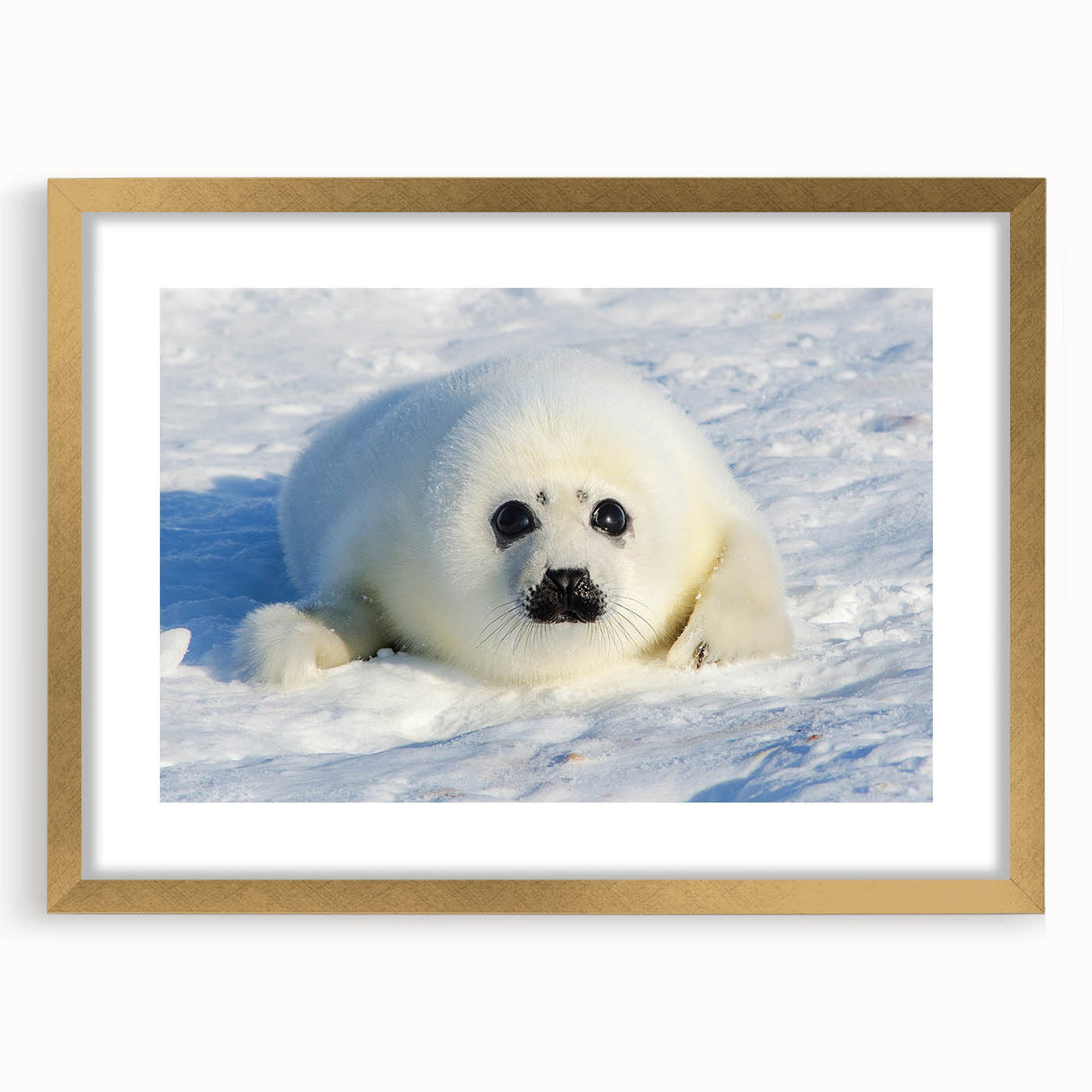 Abstract art print of a Greenlandic landscape in muted green and blue tones, framed in gold.