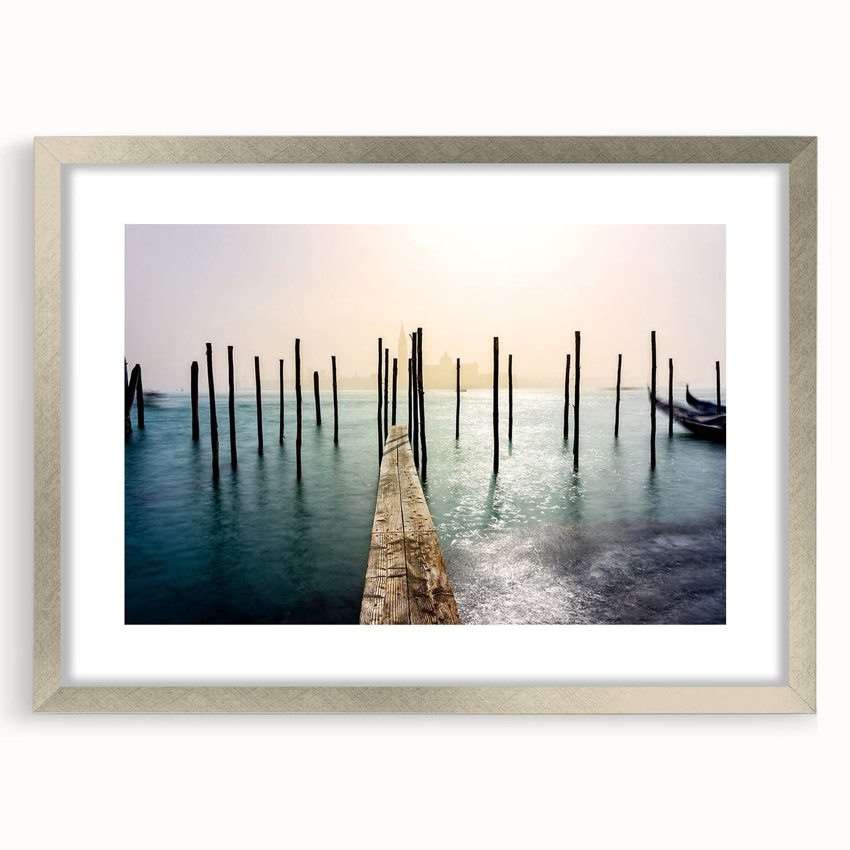 Extra large wall art featuring an abstract depiction of Venice in textured hues of blue and silver, framed in matte silver.