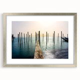 Extra large wall art featuring an abstract depiction of Venice in textured hues of blue and silver, framed in matte silver.