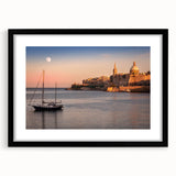 Abstract art print of European scenery in vibrant colors on a textured, extra large canvas, framed in black.