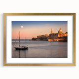 Abstract art print of a European Malta scenery in muted earth tones on a framed gold canvas, suitable for dining room decor.