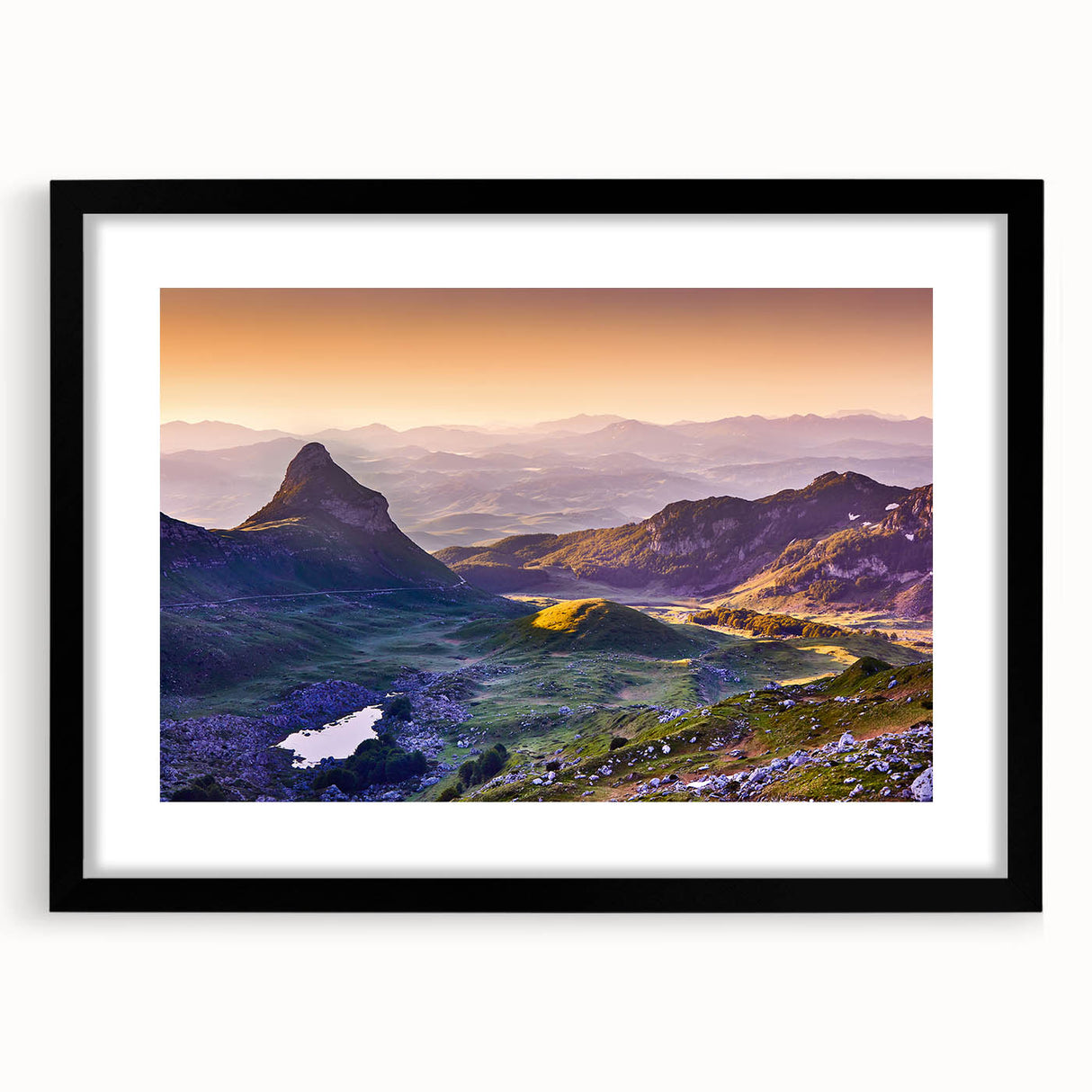 Extra large abstract art print of a colorful Montenegro scenery in a black frame, ideal for living room decor.