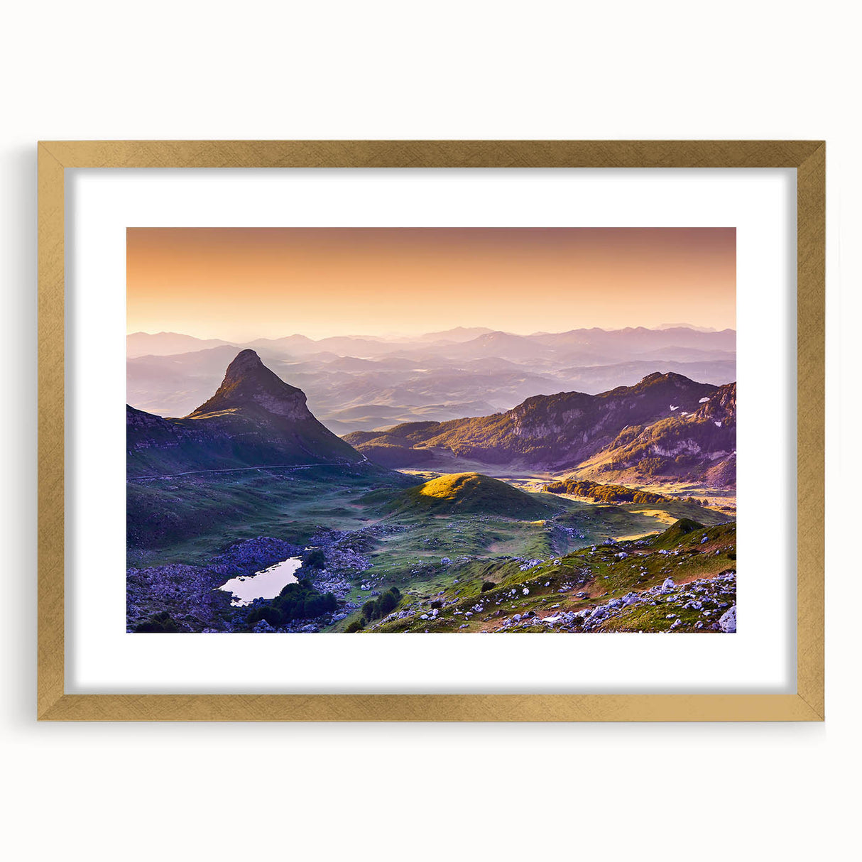 Abstract art print of a European landscape in muted blues and greens, framed in gold, suitable for dining room decor.