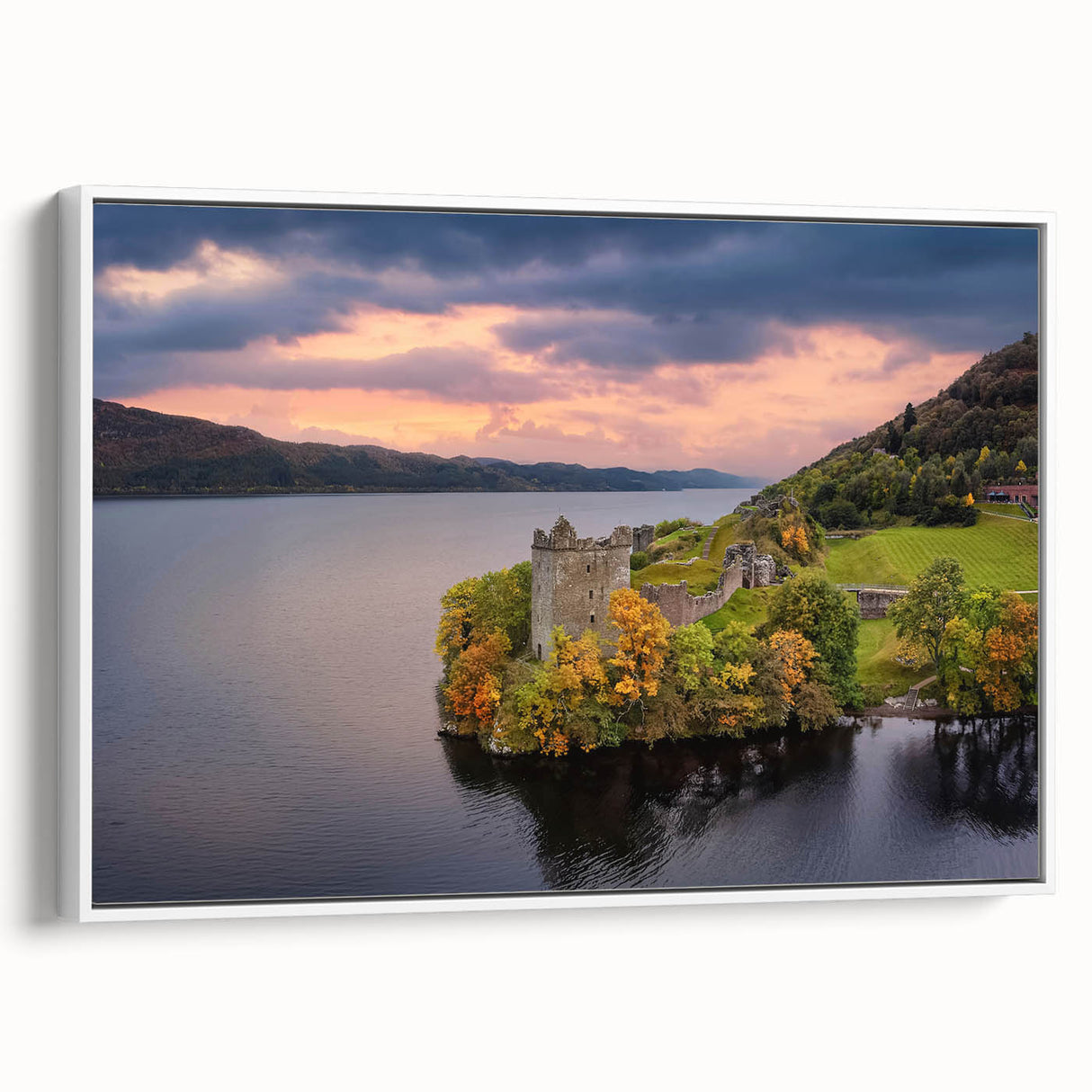 Vintage poster art of a Scottish landscape on a large framed canvas, featuring vibrant green and blue tones.