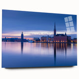 Large abstract wall art of Stockholm scenery in muted blue and green tones on acrylic glass.