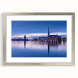Textured abstract art print of Stockholm scenery in muted gray and blue tones on a framed silver mat, ideal for bedroom art.