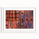 Abstract art print of Baja California scenery in muted earth tones on a framed white mat, ideal for dining room decor.