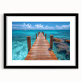 Colorful abstract art print of Cancun scenery in vibrant hues on a large framed canvas, ideal for living room decor.