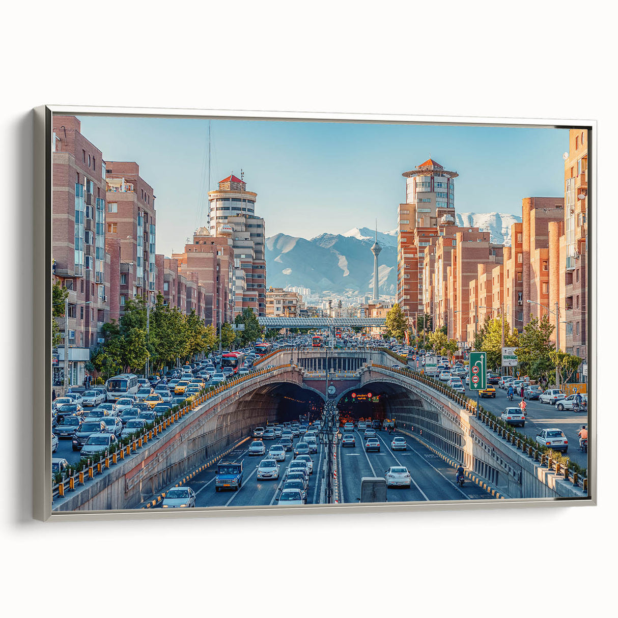 Framed canvas featuring a vintage-style landscape painting of a Middle Eastern scenery in vibrant colors.