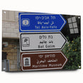 Large abstract wall art of Tel Aviv skyline in muted blue and gray tones on acrylic glass.