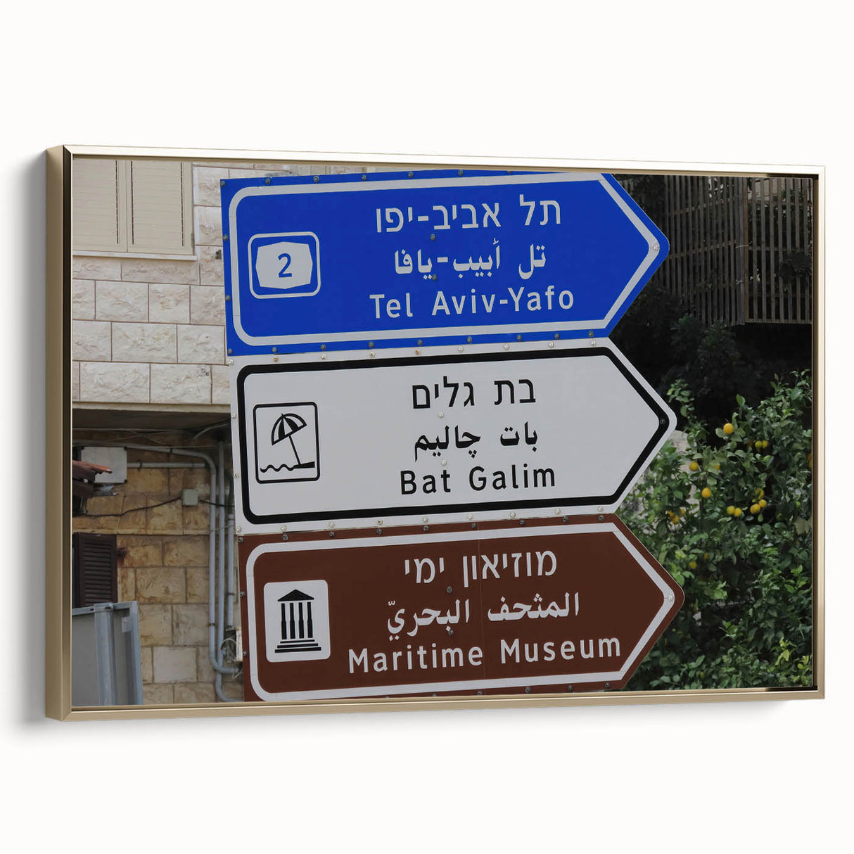 Framed canvas of Tel Aviv landscape in muted gold and black tones, ideal for bedroom wall art.