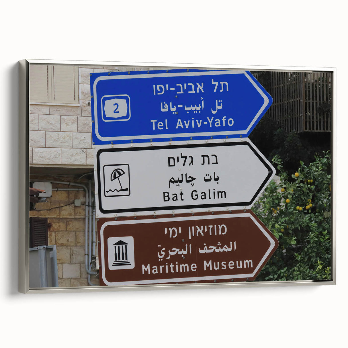 Landscape art painting of Tel Aviv featuring colorful, vintage-style poster art on black framed canvas.