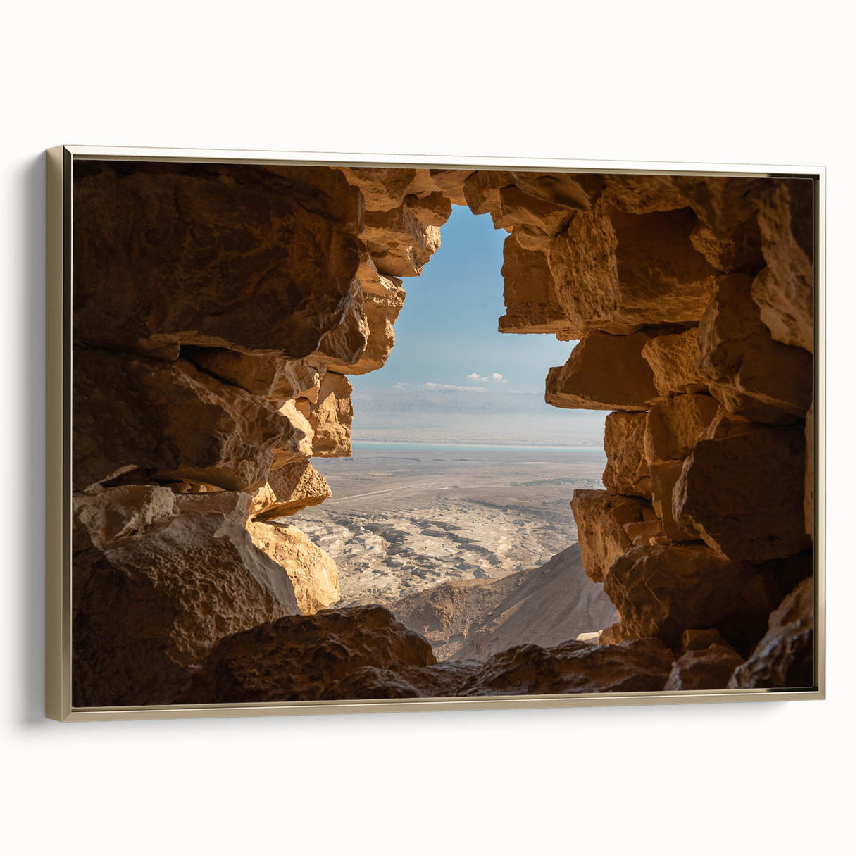 Framed canvas depicting a vintage-style landscape of the Middle East in gold and black tones, suitable for bedroom decor.